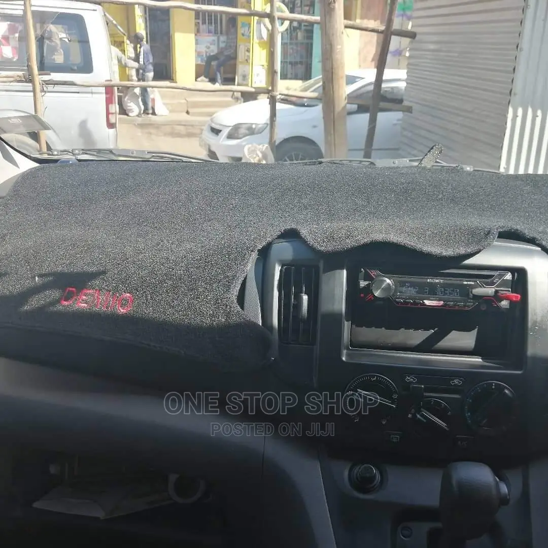 Demio Car Fitted With Branded Dashboard Cover