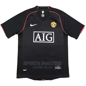Vintage Man Utd Jerseys (AIG and SHARP)