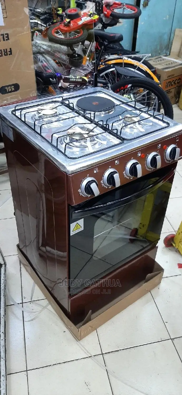 Gass Cooker With Electric Bunner