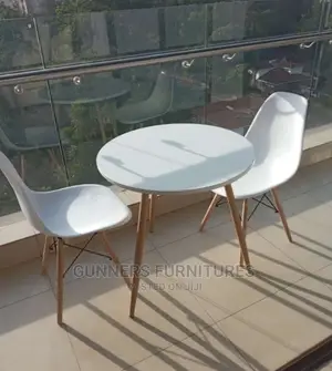 Eames Table and 2 Chairs.