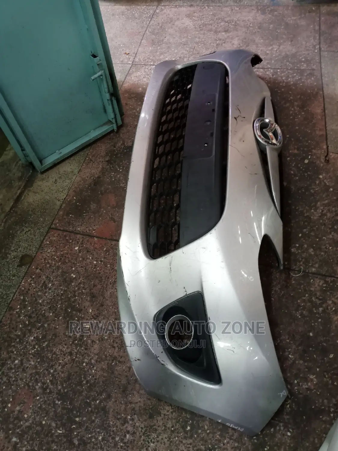 Demio 2011 Front Bumper With Foglights.