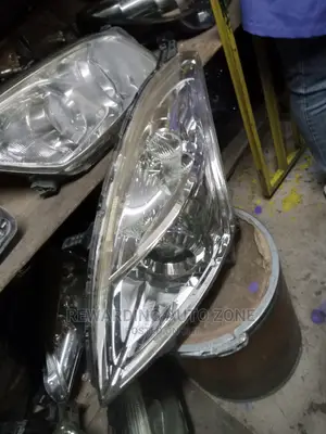 Suzuki Swift Headlight Xenon Clear.