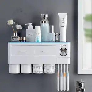 *Magnetic Inverted Automatic Toothpaste Dispenser With 4 Cup