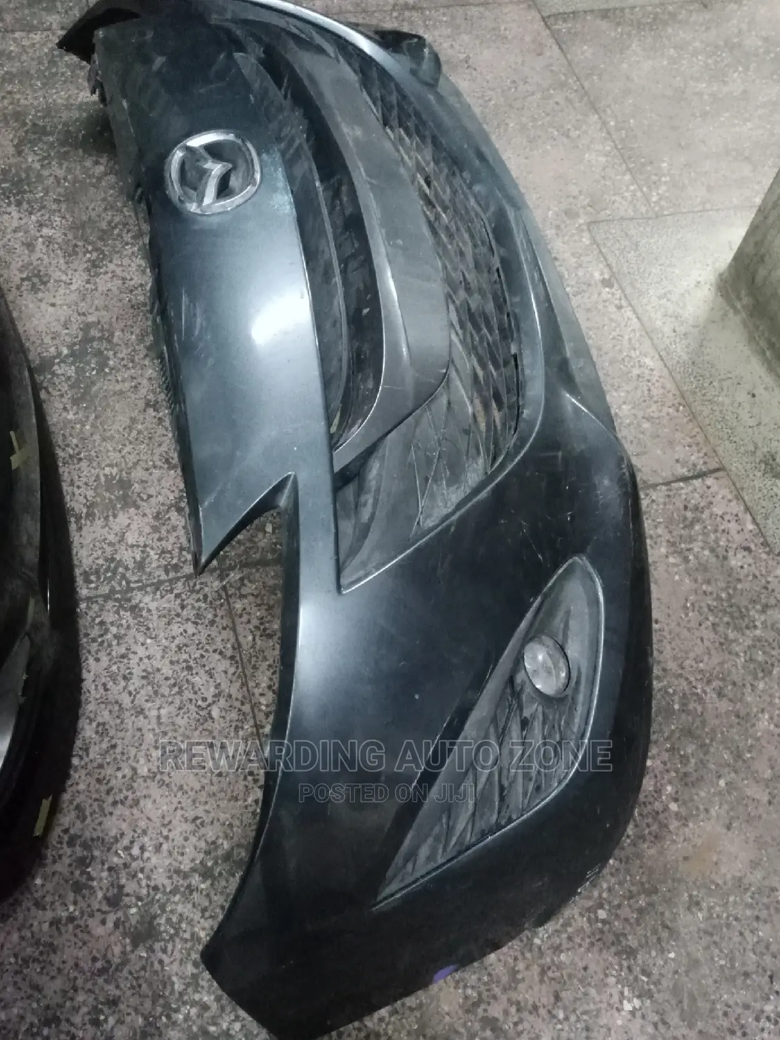 Mazda Primacy Front Bumper.