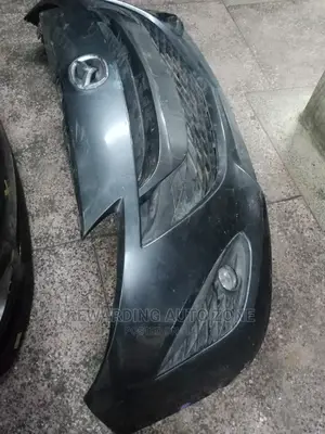 Mazda Primacy Front Bumper.
