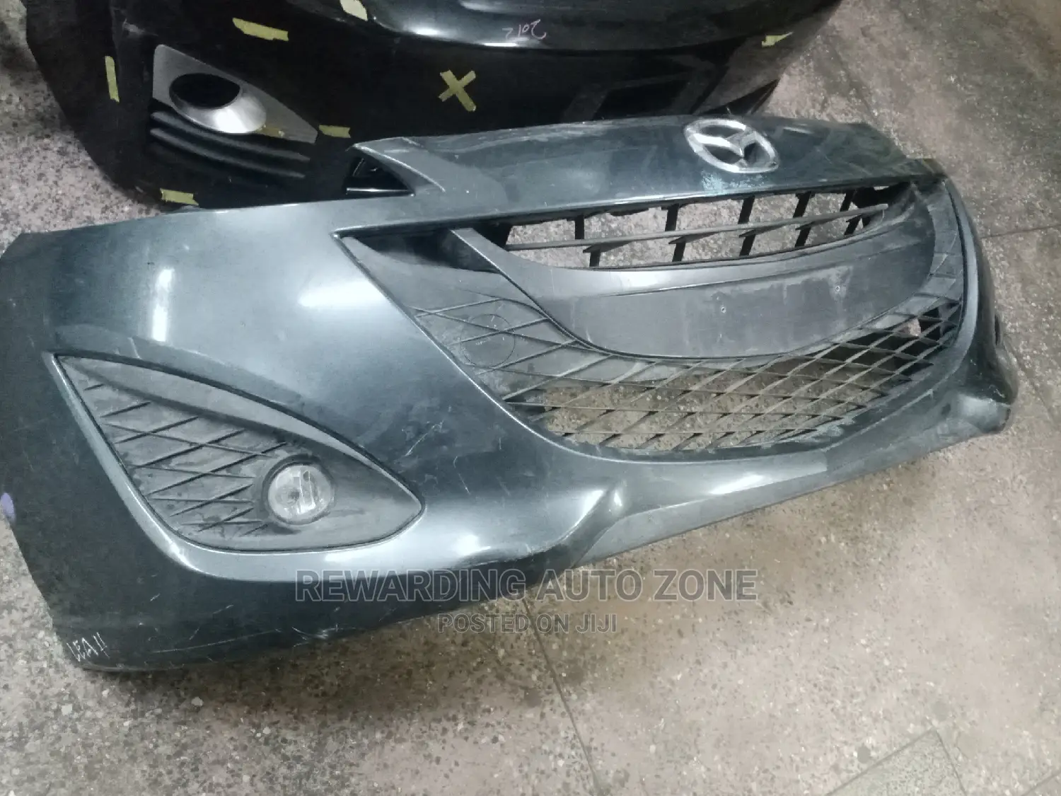 Mazda Primacy Front Bumper.