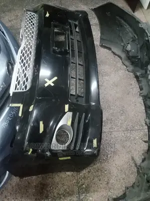 Voxy 2012 Front Bumper.Complete With Grille.