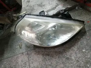 Nissan Tiida 2009 Headlight.