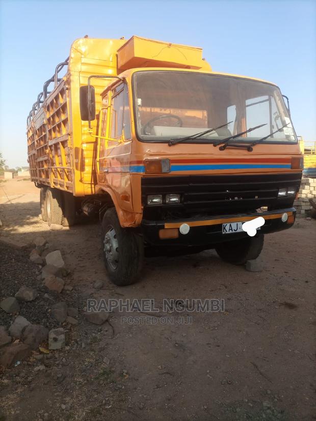 Nissan Diesel Truck Kaj 1997 Yellow - main view
