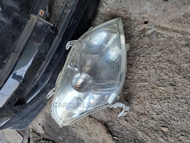 Toyota Raum Headlights