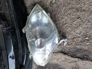 Toyota Raum Headlights