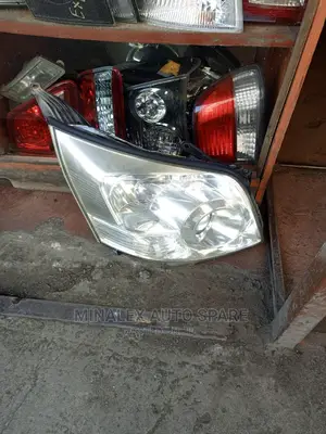 Noah 08 Zenon Headlights