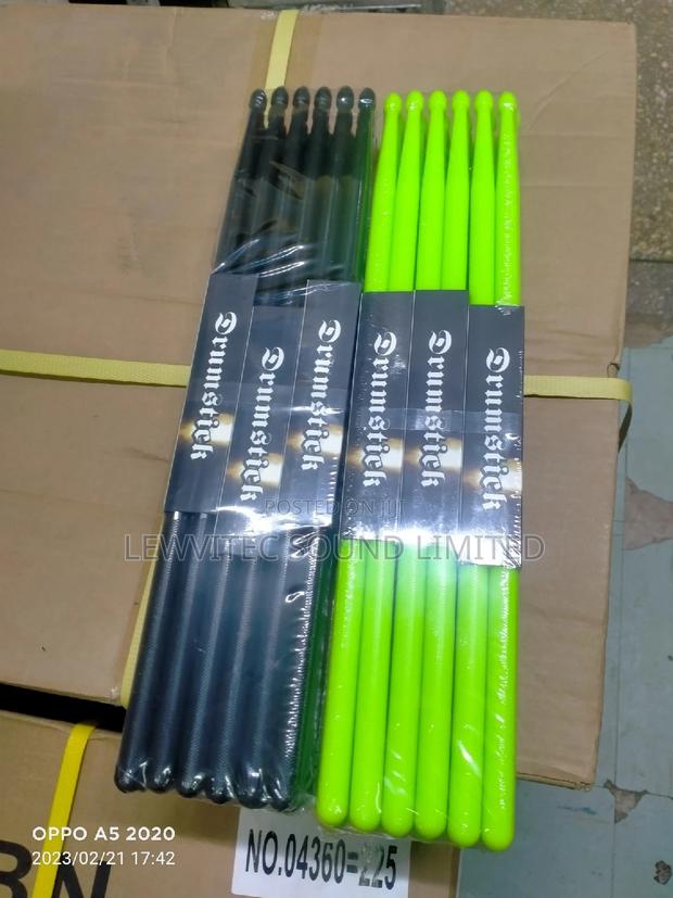 Black, Green Plastic Sticks - main view