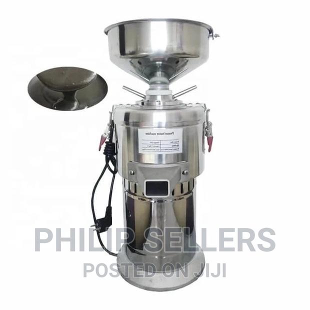 Commercial Electric Peanut Butter Maker Adopts Ancient Metho