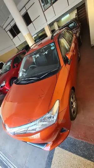 2015 Toyota Corolla Fielder in Orange: Affordable, Stylish, and Reliable