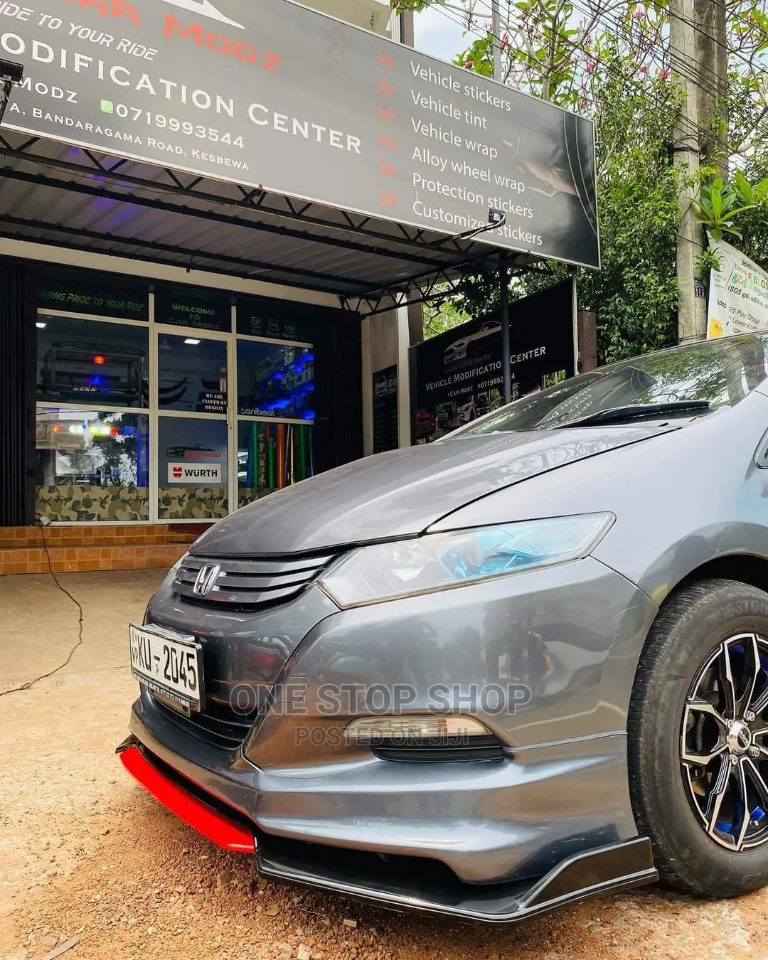 Car Fitted With Front Plastic Bumper Lip (Black and Red)