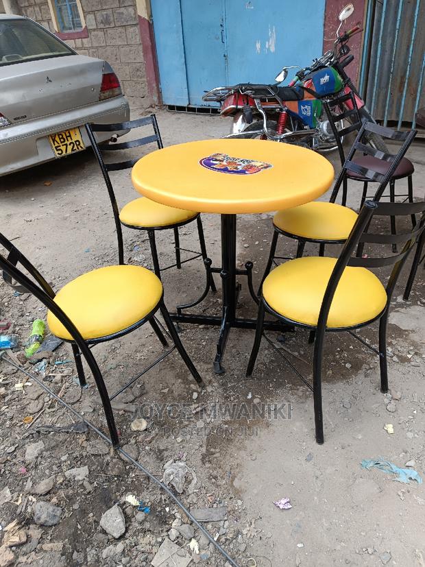 Restaurant Set of 4 Chairs and a Table. - main view