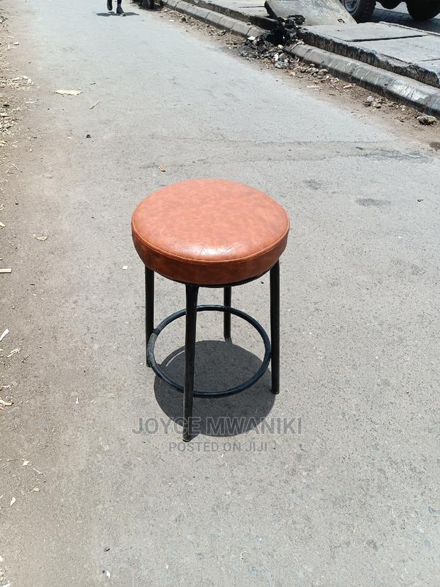 Backless Round Leather Stool. - main view