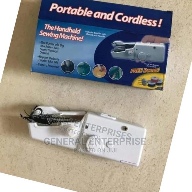 Hand Held Sewing Machine
