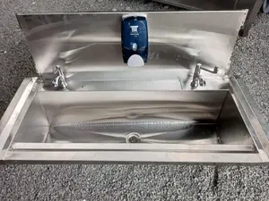 Scrub Sink With Taps and Soap Dispenser