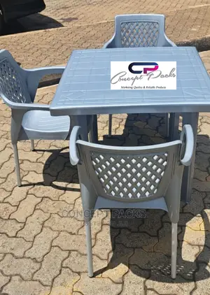 Square Plastic Table + 3 Metal Tubing Chairs.