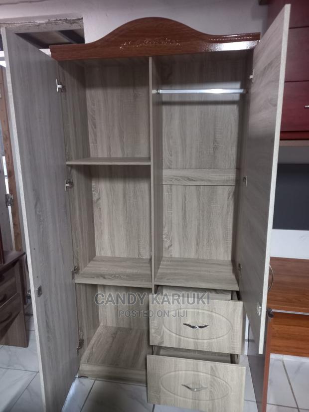 Beige 2 Door Closet