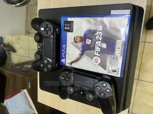PS 4 Slim , 2 Pads , Fifa23