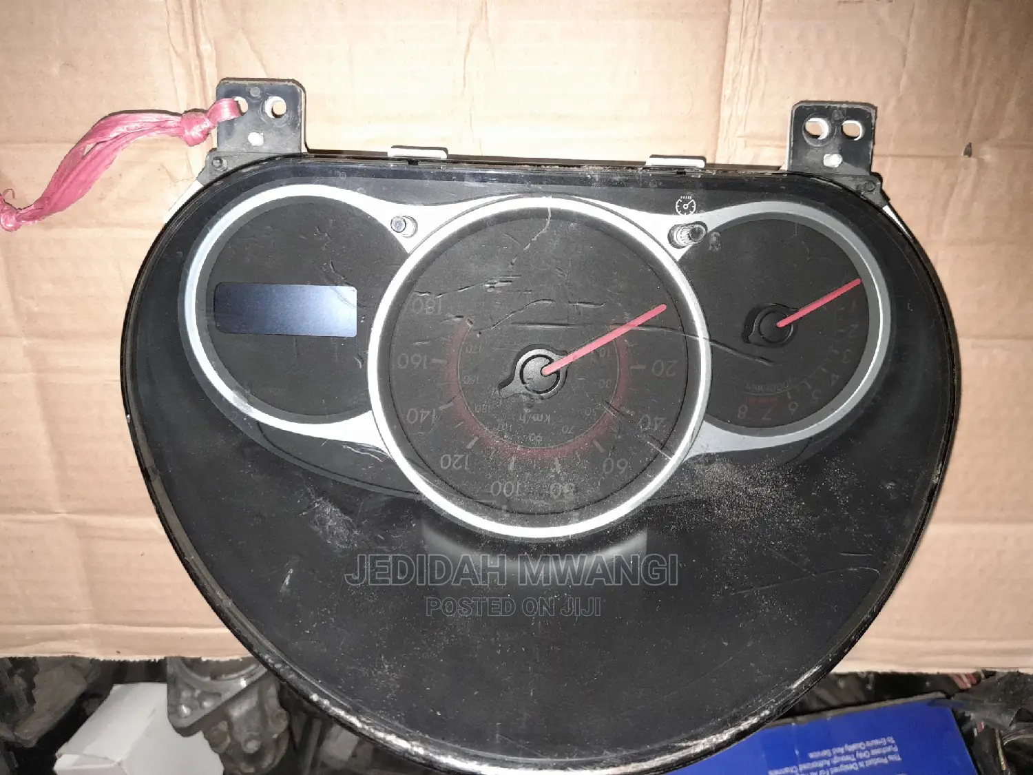 Clock Mazda Demio