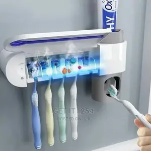 *Toothpaste Dispenser With Toothbrush Sterilizing Station