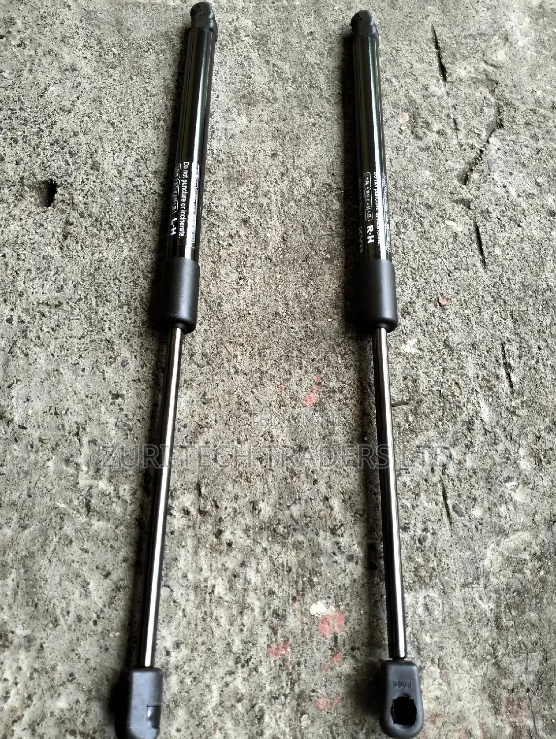 Nissan Teana Bonnet Shocks