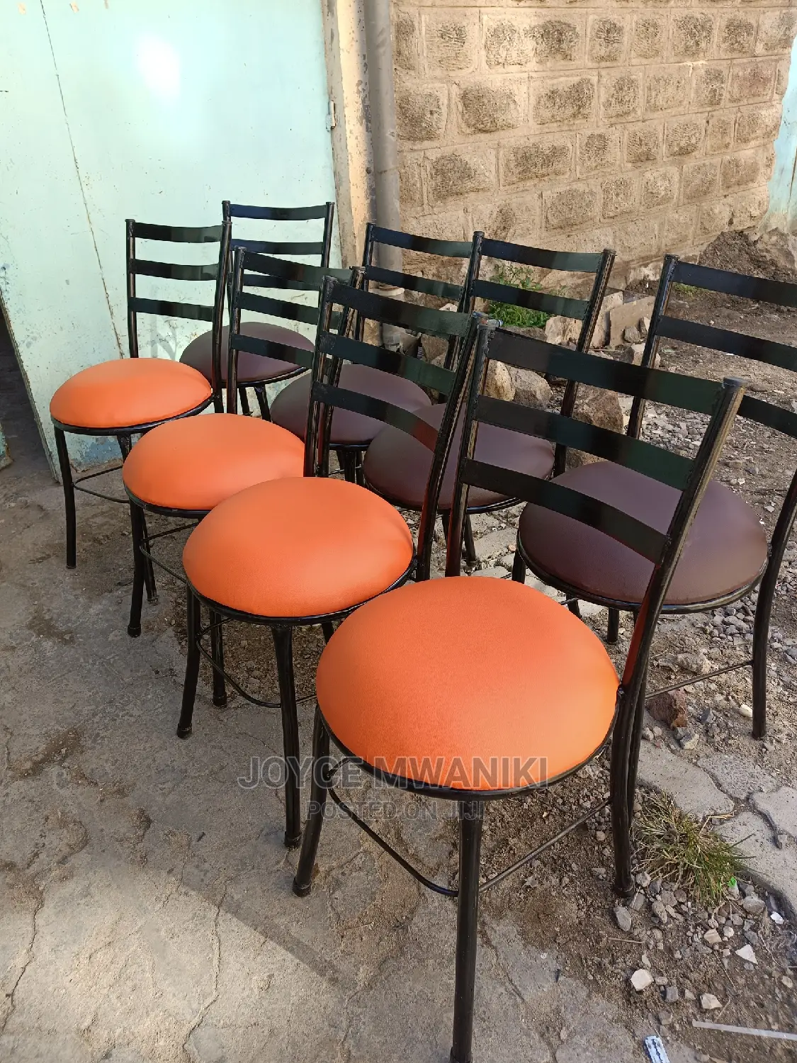 Flat Chairs for Restaurant Orange and Brown in Colour.