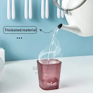 Toothbrush Holder and Toothpaste Dispenser