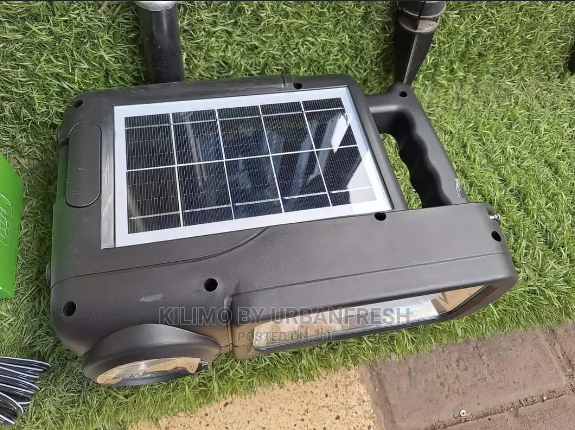 Solar Powered Music ,Phone Charging Lighting System.