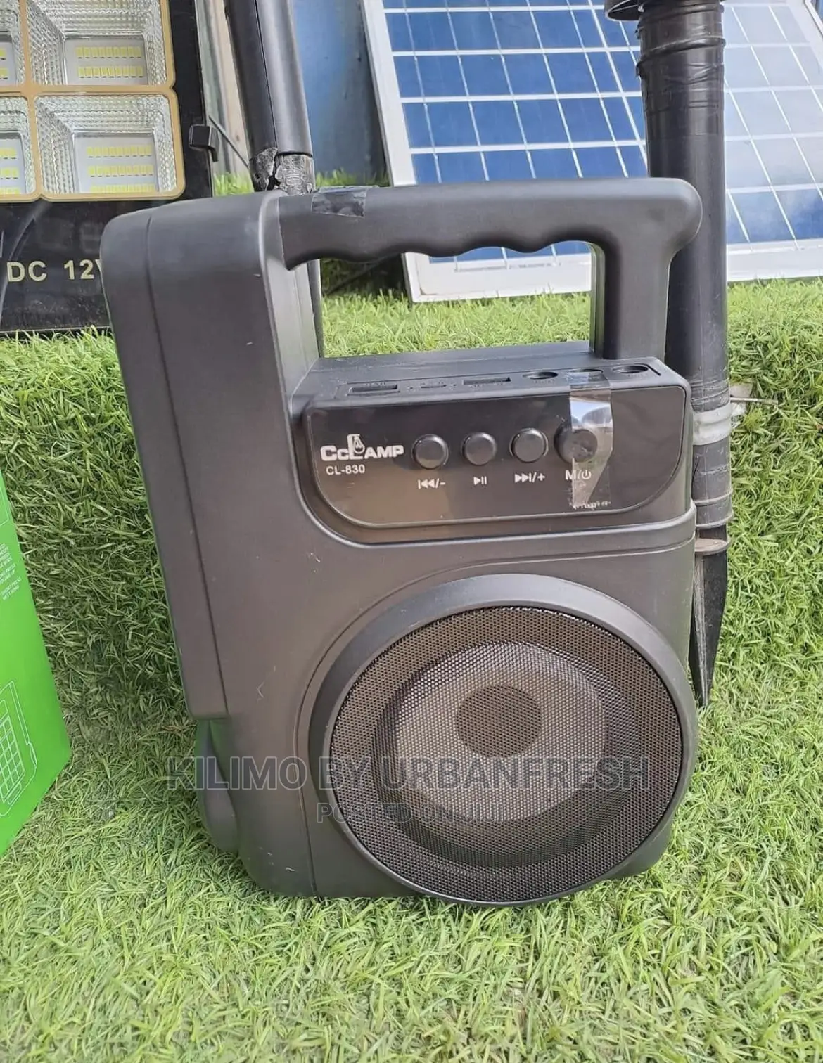 Solar Powered Music ,Phone Charging Lighting System.