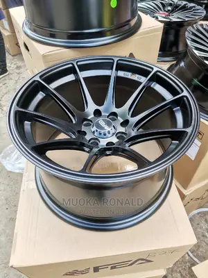 15inch Offset Rims 4holes Black in Color