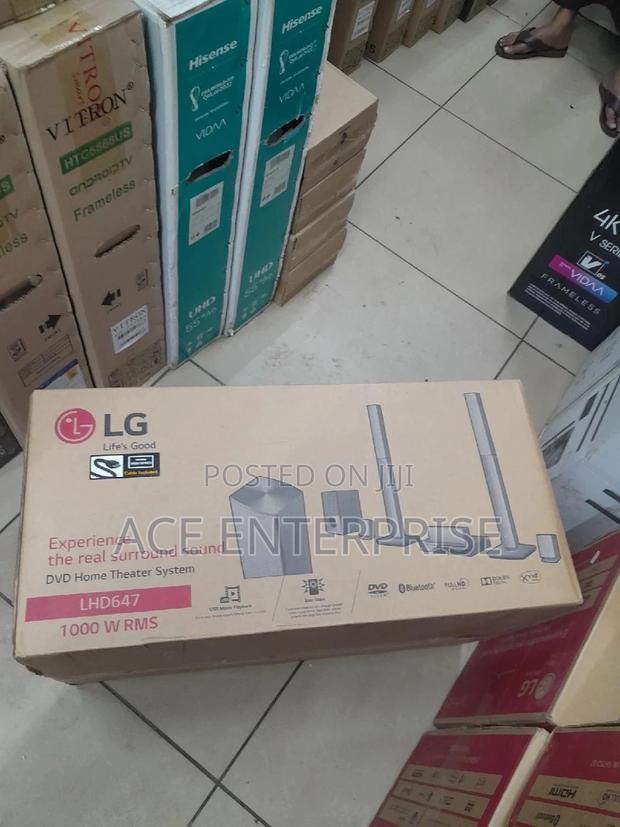 LG 1000W Hometheatre, Bass Blast, Bluetooth Fm - main view