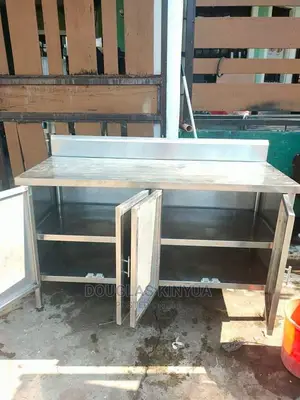 Stainless Steel Working Table Top Cabinet ( 4tf by 2ft):