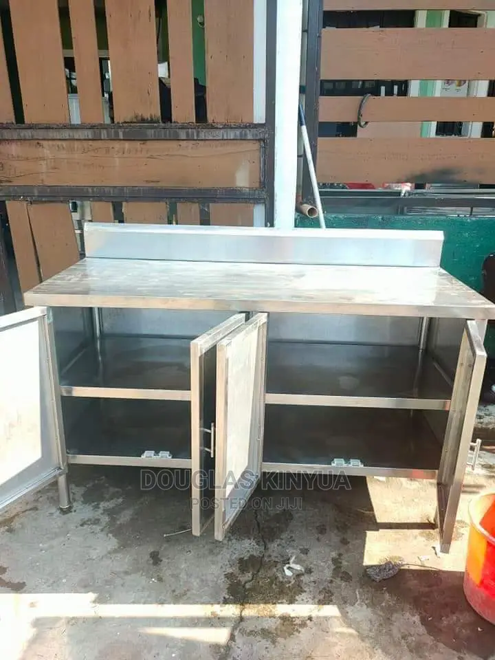 Stainless Steel Working Table Top Cabinet ( 4tf by 2ft):