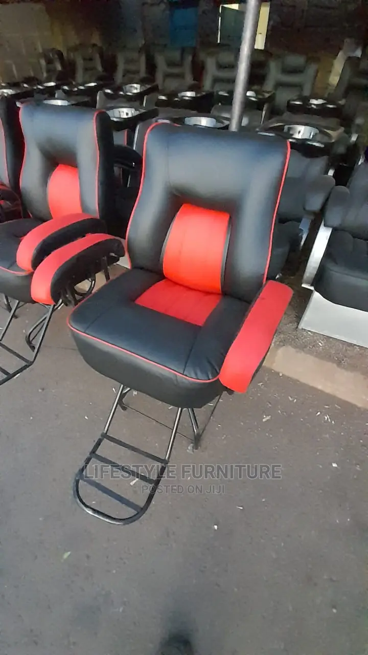 Kinyozi Chair. Rotating