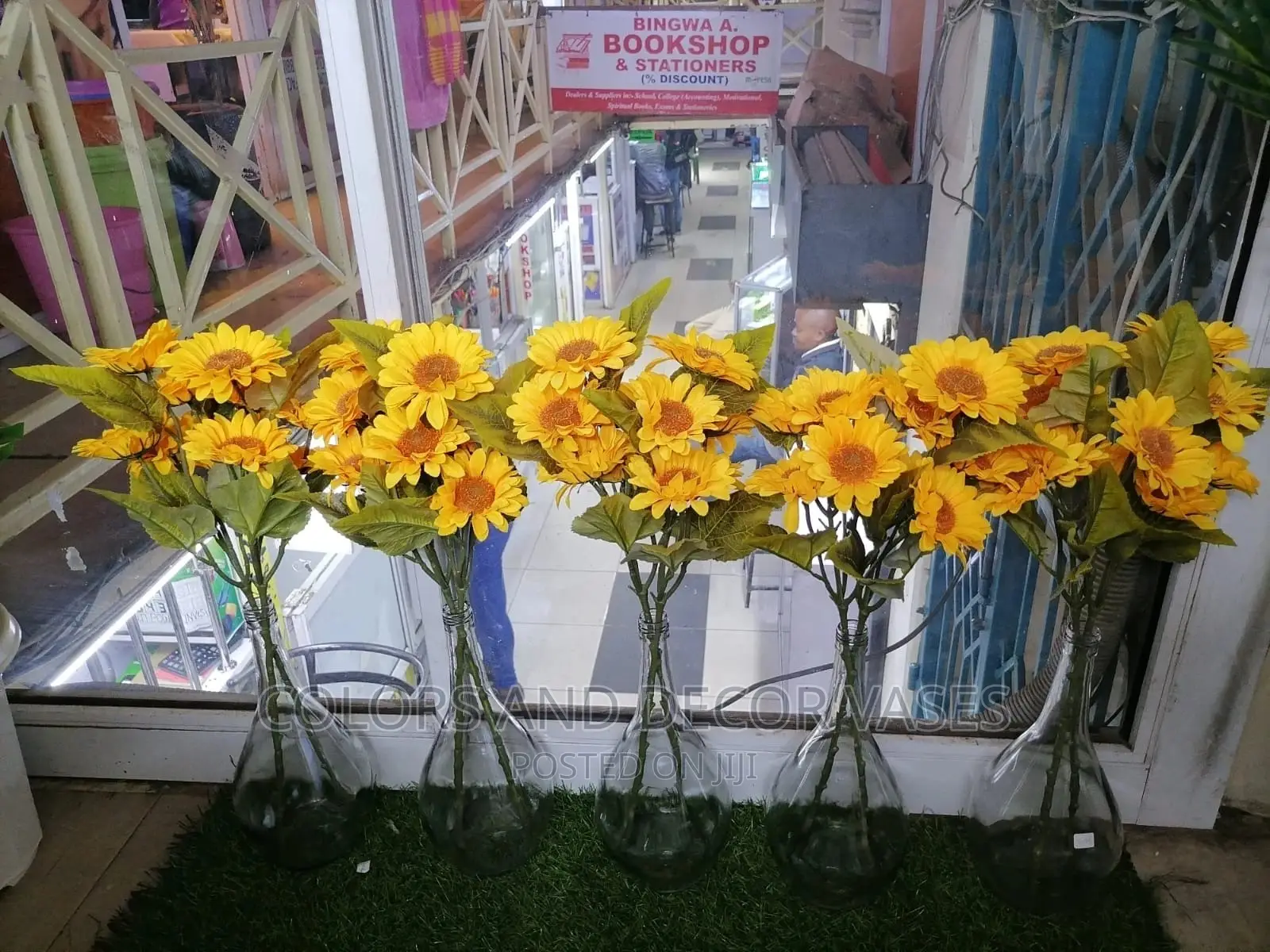 Sunflowers and Glass Vases