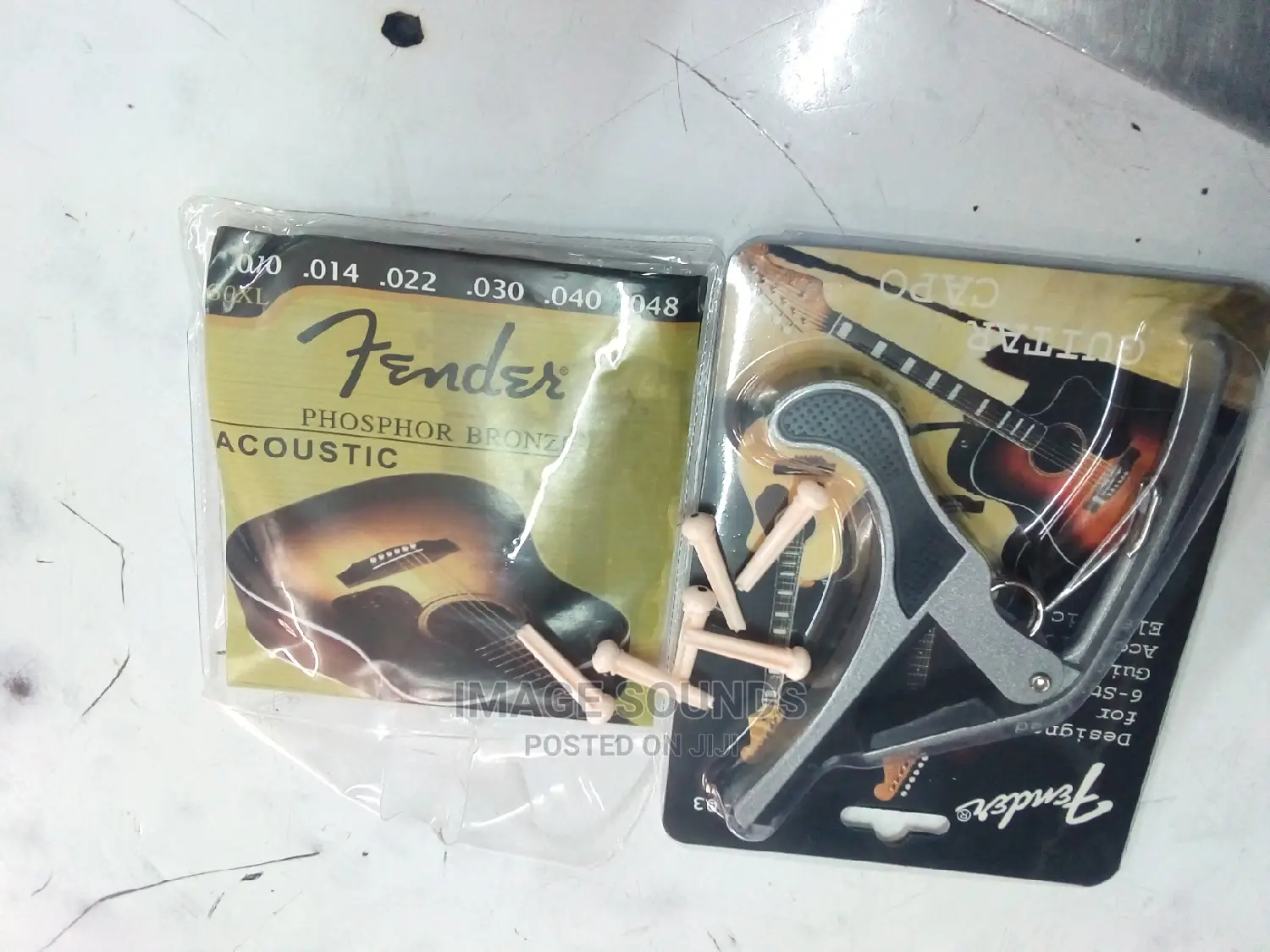 Acoustic Strings With Capo and Pins