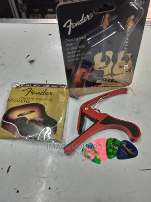 Guitar Capi With Strings and 4 Picks - thumbnail 2