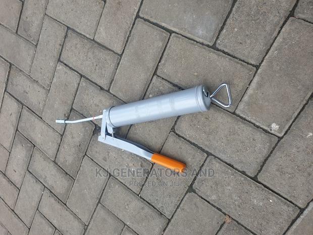 Hand Held Greasing Gun - main view