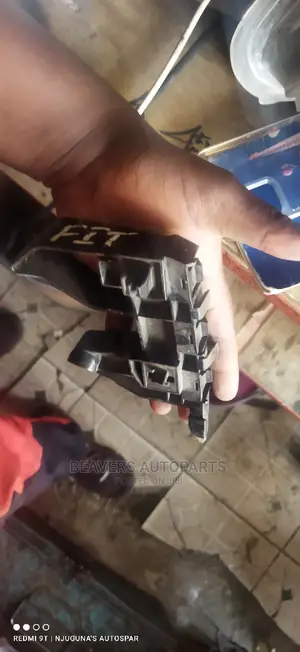 Honda Fit Bumper Slide / Retainer