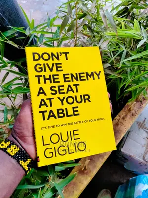 Don't Give the Enemy a Seat at Your Table Book by Louie Gigl