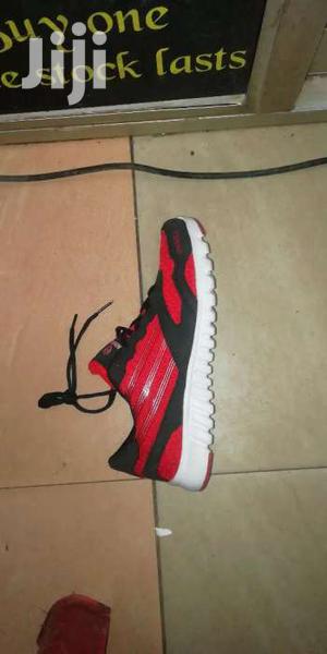 Gym Shoes and Body Work Out