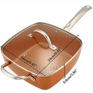 A Copper Pan Has a Temperate Glass Lid
