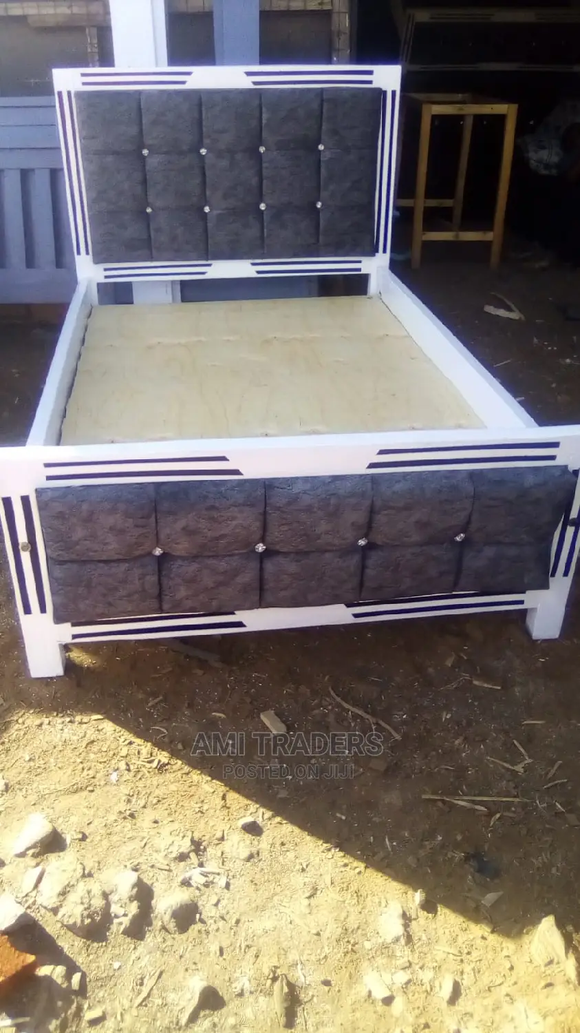 Gray Tufted Bed