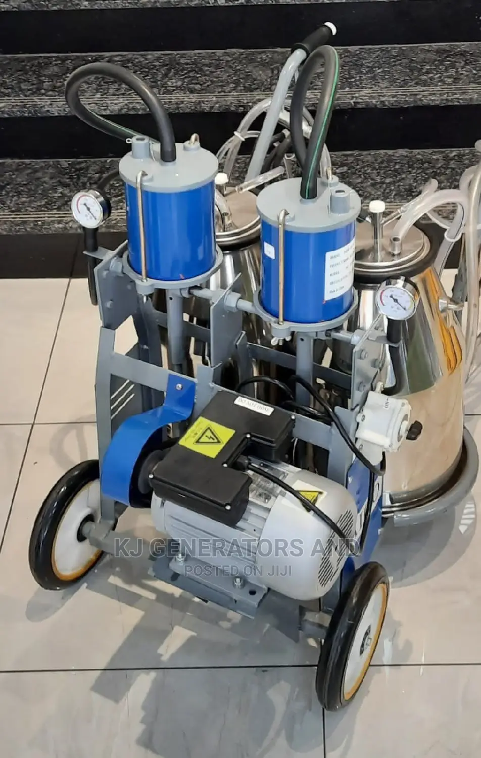 Two Burrell (Double) Milking Machine.