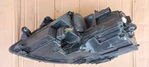 Volkswagen Jetta (Mk6) Left Nonxenon Headlight Assembly